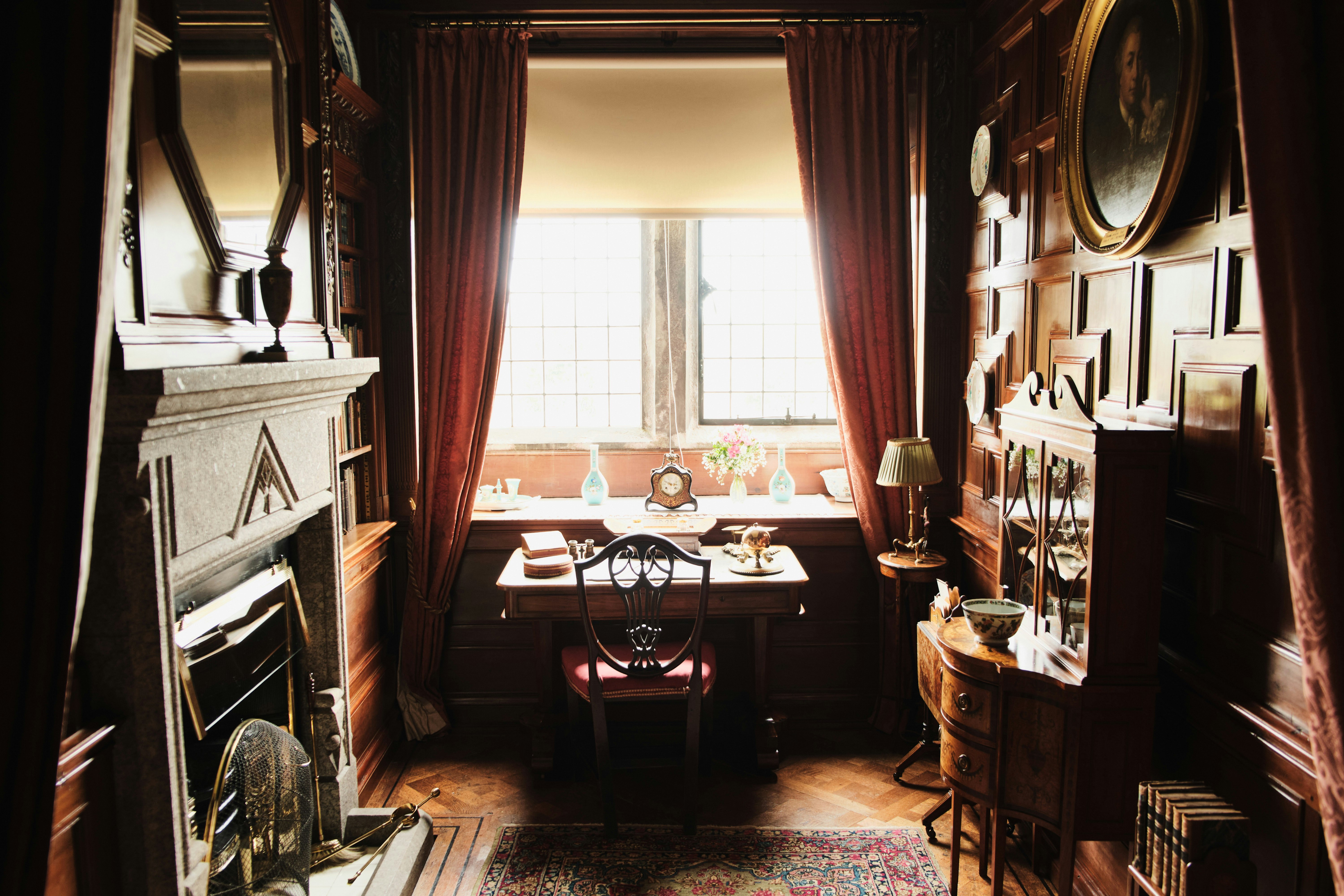 brown wooden dining table near window